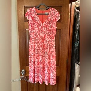 NWOT fit and flare dress flutter sleeve orange with leaf print